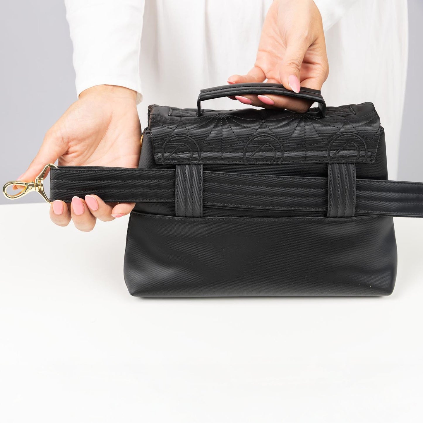 Wicked x Lug Plié Satin Luxe VL Crossbody Bag - - 25293_Wicked_PlieSatinLuxe_Black_Lifestyle_06